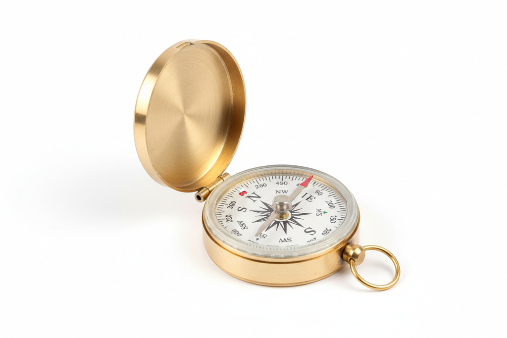 Create ultra-realistic product images for SKU BR-0002, a Premium Brass Directional Compass with polished brass and light antique finish.
The compass should include manufacturable engraved branding ‘Brastik’ only on the outer lid.
Show realistic angles: open lid, closed lid with engraving, 45-degree hero angle, side profile, and a macro close-up of the engraving.
Maintain true brass reflections, accurate dial markings, real hinge mechanism, and a floating compass needle. Use a clean white or soft-neutral bac