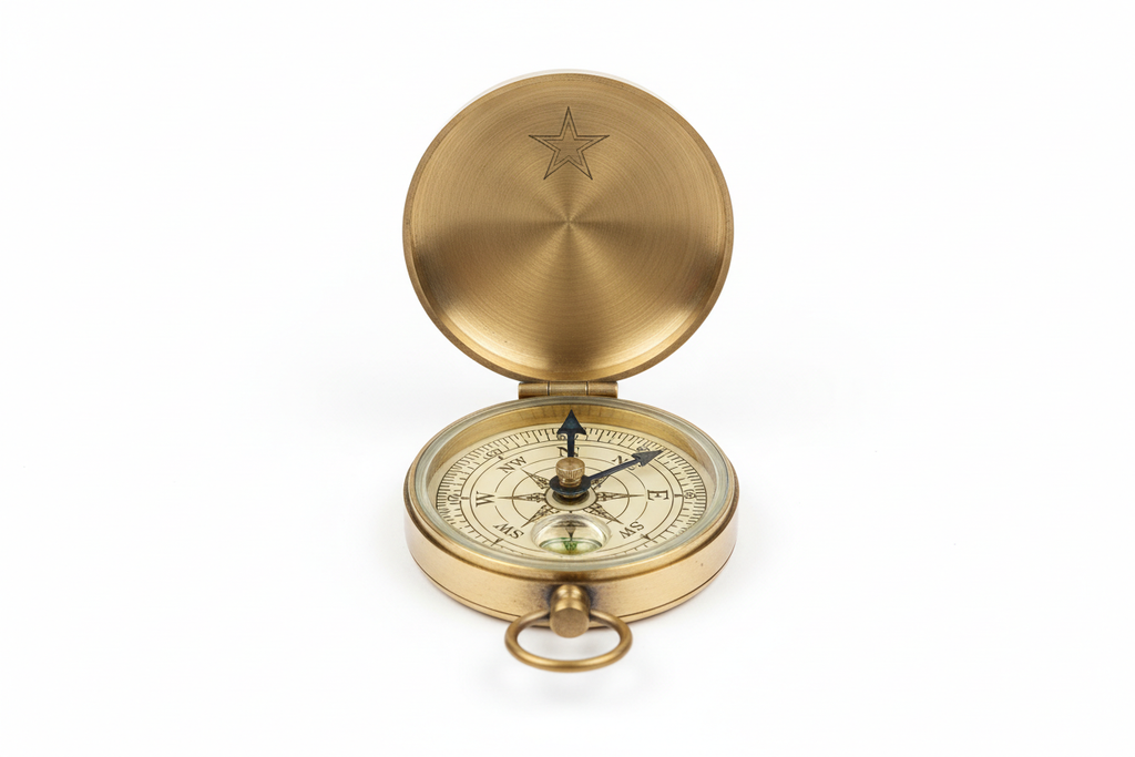 “Generate ultra-realistic product images for SKU BR-0001, a Vintage Brass Pocket Compass made from polished brass with a slight antique finish. The compass should be round, approximately 6 cm diameter, with a hinged lid, clear engraved cardinal markings, a functional floating needle, and a glass top.
Create multiple manufacturable, realistic angles:
• Front view with lid open showing the dial
• Closed lid top view with engraved pattern
• Side profile showing hinge and thickness
• 45-degree angle showing bra
